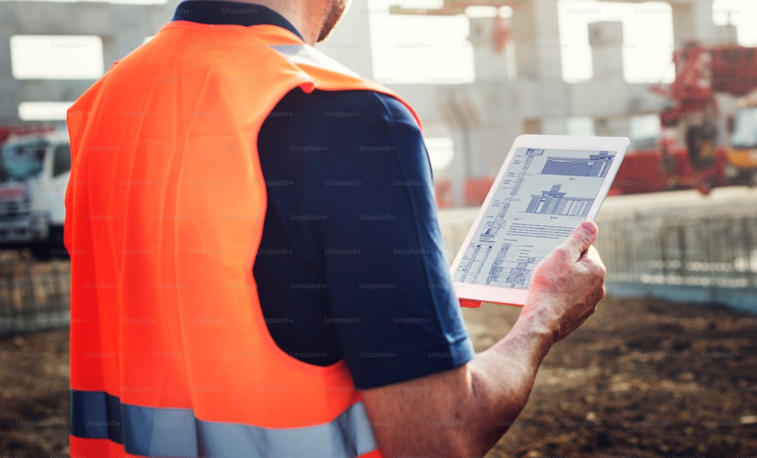 Contractor using tablet on job site